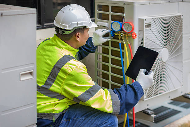 Professional Air Duct Cleaning technician working in Wooster, AR
